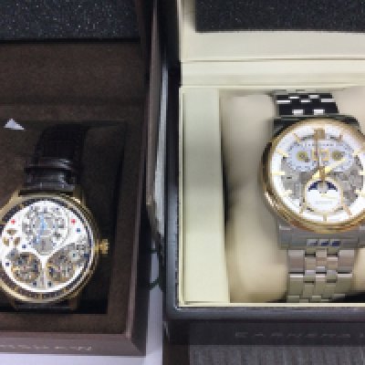 Two Earnshaw automatic wrist watches including a moon phase model. Both in excellent condition and seen running. Postage B