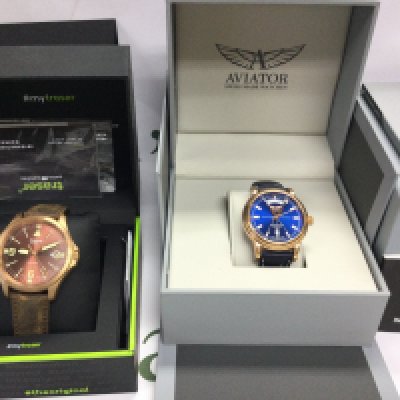 An Aviator Swiss made day date gents automatic watch and one other. Both in boxes with paperwork. Postage B