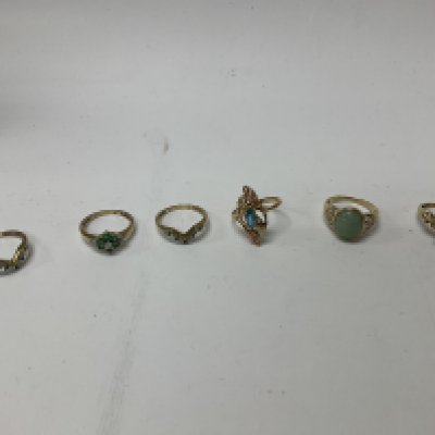 Six 9ct gold stone set rings. Approx weight 14.8 grams .