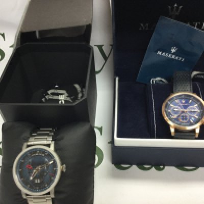 Two gents watches including a Maserati and a Police watch both with boxes and paperwork. Postage B
