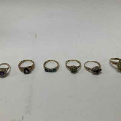 Six 9ct gold stone set rings, approx weight 18.25 grams.