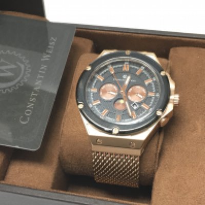 A mens gold tone Constantin Weisz automatic moon phase calendar watch, model 19s007CW-50mm case, complete with box and paperwork. Postage category B