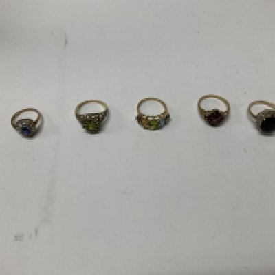 Five 9ct gold stone set rings, approx weight 17.4 grams.