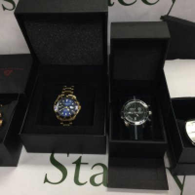 Small collection of watches in their original boxes. Including Swiss legend and Ben Sherman etc. Postage B
