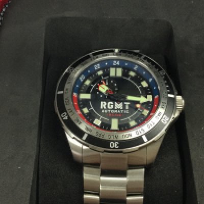 A RGMT automatic gents wrist watch with box and paperwork. In as new condition. Postage B