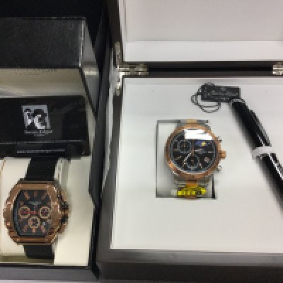 A Swan and Edgar automatic watch with box and papers seen working and a Mathew Tissot Ltd edition quartz watch with box not seen working. Postage B