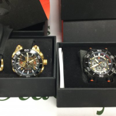 Two Nubeo gents watches with boxes. One automatic and one quartz. Postage B