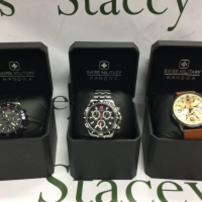 Three Swiss Military Hanowa watches with boxes. Postage B