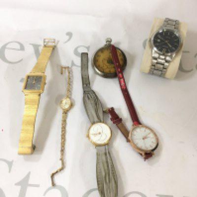 A small collection of watches including a ladies 9ct gold watch.