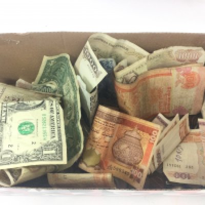 WITHDRAWN - - A collection of mixed world notes and coins. Postage category B. NO RESERVE