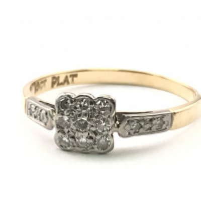 An 18ct gold and platinum art deco diamond ring , 1.65g total weight, ring size O. Postage category A