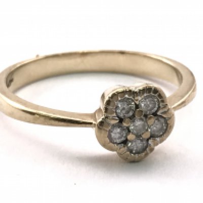 A 9ct gold ring inset with diamonds in the form of a flower, ring size P, 2.3g total weight. Postage category A