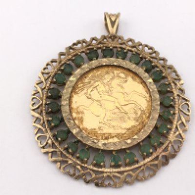 A 1979 full sovereign in 9ct gold mount. 14.88g Postage A