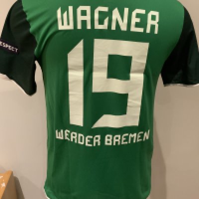Slavia Prague 2010 - 2011 Match Worn Football Shirt: Green short sleeve shirt with Champions League badging to sleeves. Wagner 19 to rear. Worn during the 2-2 draw against Tottenham on 14 September 2010. Player was a second half substitute. 