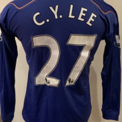Bolton Wanderers 2010 - 2011 Match Worn Football Shirt: Blue long sleeve shirt with Premier League badges to sleeves. C Y Lee 27 to rear.