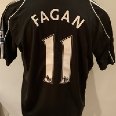 Derby County 2007 - 2008 Match Worn Football Shirt: Black short sleeve shirt with Premier League badges to sleeves. Fagan 11 to rear. Worn v Tottenham on 18 August 2007.