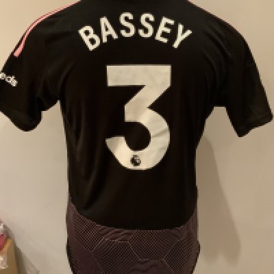 Fulham 2023 - 2024 Match Worn Football Shirt: Black and pink short sleeve shirt with Premier League badges to sleeves. Bassey 3 to rear. Worn v Tottenham on 23 October 2023.