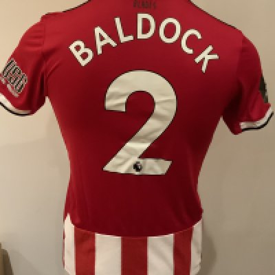 Sheffield United 2020 - 2021 Match Worn Football Shirt: Red and white short sleeve shirt with Black Lives badge to sleeve. Baldock 2 to rear. Worn v Tottenham on 2 May 2021.