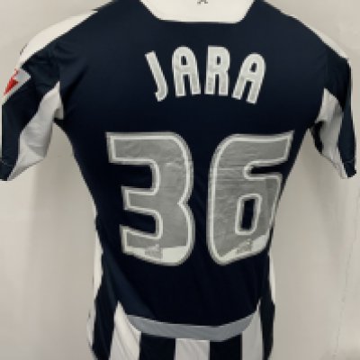 West Brom 2009 - 2010 Match Worn Football Shirt: Blue and white short sleeve shirt with number 36 Jara to rear. Rare unsponsored shirt with Coca Cola sleeve badging. 
