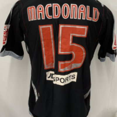 West Brom 2006 - 2008 Match Worn Football Shirt: Black short sleeve shirt with Coca Cola Football League badging to sleeves. MacDonald 15 to rear. 