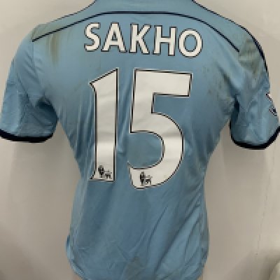 West Ham 2014 - 2015 Match Worn Football Shirt: Blue short sleeve shirt with Premier League badging to sleeves. Sakho 15 to rear. Shirt is unwashed. 