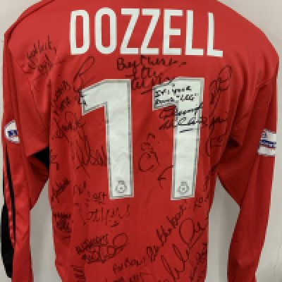 Colchester United 2001 - 2002 Match Worn Football Shirt: Red long sleeve third shirt with Nationwide League badging to sleeves. Dozzell 11 to rear. This was signed by his team mates after his final appearance for the club. 