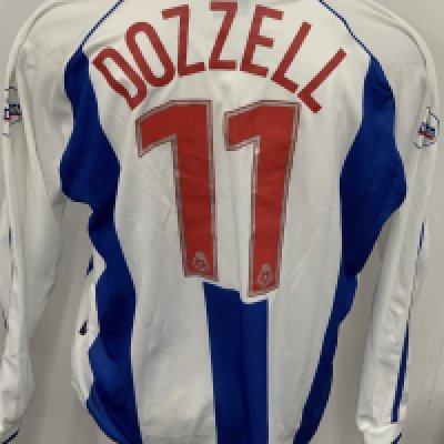 Colchester United 2001 - 2002 Match Worn Football Shirt: Blue and white long sleeve shirt with Nationwide League badging to sleeves. Dozzell 11 to rear.