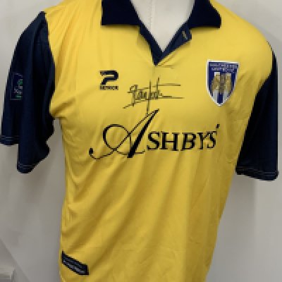 Colchester United 1997  - 1998 Match Worn Football Shirt: Yellow short sleeve shirt with Nationwide League badging to sleeves. Number 14 to rear. Worn by Steve Forbes and signed by him to front. 