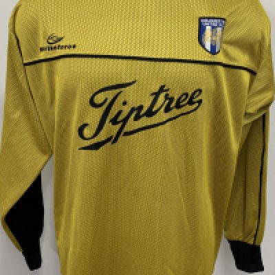 Colchester United 2002  - 2003 Match Worn Football Shirt: Yellow long sleeve goalkeepers shirt with Nationwide League badging to sleeves. Brown 1 to rear.