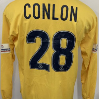 Colchester United 2000 - 2001 Match Worn Football Shirt: Yellow long sleeve shirt with Nationwide League badging to sleeves. Conlon 28 to rear. Signed to front by the squad. 