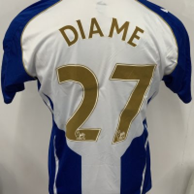 Wigan Athletic 2009 - 2010 Match Worn Football Shirt: Blue Vandanel 188 Bet short sleeve shirt with Premier League badging to sleeves. Number 21 Diame to rear. 