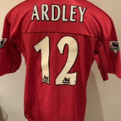 Wimbledon 1999 - 2000 Match Issued Football Shirt: Red short sleeve shirt with Premier League badges to sleeves. Ardley 12 to rear. Issued v Spurs on 22 April 2000.