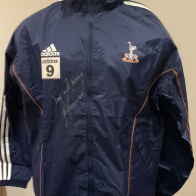 Tottenham 2000 - 2001 Football Players Training Kit: Number 9 used by Les Ferdinand. Comprises of rain jacket, one blue and one white Adidas Holsten tee shirt. Rain jacket is signed without dedication. (3)