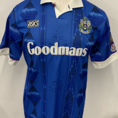 Portsmouth 1994 - 1995 Match Worn Signed Football Shirt: Blue Goodmans Asics short sleeve shirt with Football League badging to arms and 1194-1994 800 years. Number 7 to rear. 