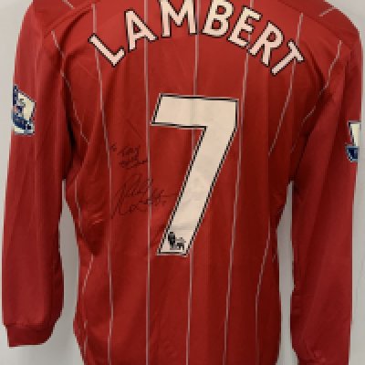 Southampton 2012 - 2013 Match Worn Lambert Football Shirt: Red long sleeve home shirt with Premier League sleeve badging. Signed to front and back with dedication. Number 7 Lambert to reverse. 