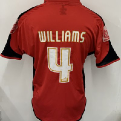 Accrington Stanley 2007 - 2008 Match Worn Football Shirt: Red short sleeve Fraser Eagle sponsored shirt with Coca Cola Football League badging to arms. Number 4 Williams to rear. Sponsorship and sleeve badging wear. Williams infamously got banned at the end of this season. 