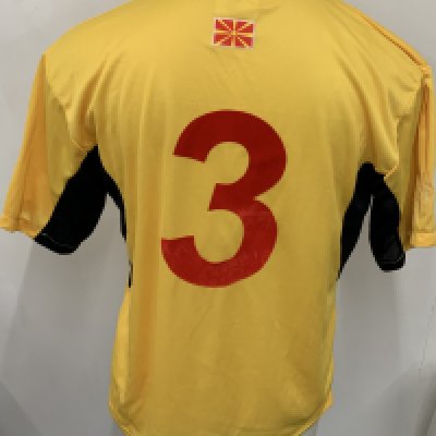 Macedonia 2006 Match Worn Football Shirt: Yellow short sleeve third shirt. Number 3. Worn by Noveski in a World Cup qualifier. Sleeve badge we believe got washed off. Evidence it has been there but now missing. 