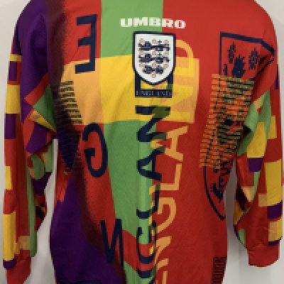 England 1996 Original Replica Goalkeepers Football Kit: Shirt is very good with a few small pulls, shorts size 38 are unused with tag still attached and socks look unworn. Multi Coloured kit is still very bright and original from the mid 90s. 