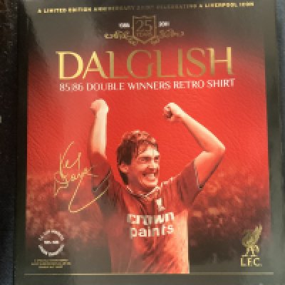 Boxed Liverpool 1985 - 1986 Double Winners Football Shirt: Signed with dedication by Kenny Dalglish to number 7. Bi-fold box in slip case also contains replica medal and season DVD. 