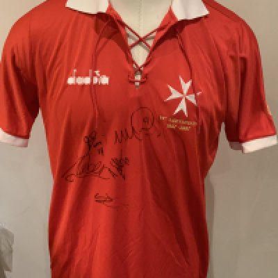 Malta Match Worn Football Shirt: Red short sleeve Diadora shirt with number 10 to rear. Signed to front by 5 Players 