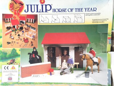 A Boxed Julip Horse Of The Year Open Stall #1802.