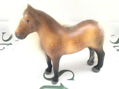 An Original Julip Horse Dappled Golden Dun With Grey Mane, Star And Black Stockings.