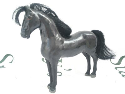 A Julip 1970s American Quarter Horse, Black With Star.