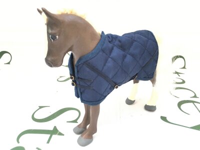 A 2007 Julip Cob Stallion, liver aces nut In Colour With White Mane, Blaze And 2 Socks.”Rocky”.