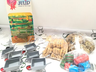 A Box Containing A Large Collection Of Julip Yard Accessories.