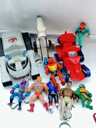 A Box Containing Vintage 80s Toys, Including The A Team, He Man, Thunder Cats Transformers Etc.