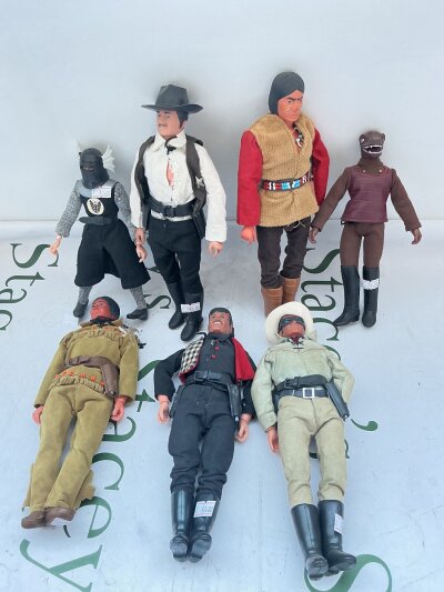 a Collection Of 7 Vintage Mego Figures.