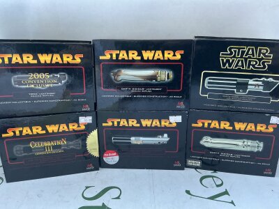 6 Boxed Star Wars Mater Replica Mini Lightsabers.