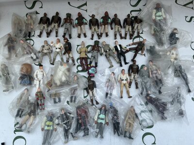 A Box Containing Vintage And Modern Star Wars Figures.