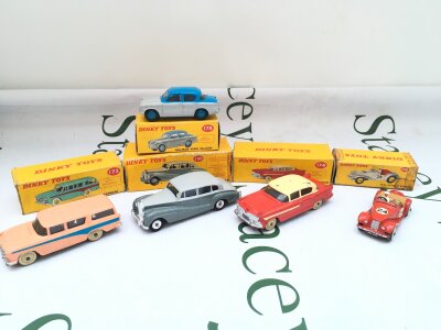 5 X Boxed Dinky Vehicles, A Nash Rambler #173, A Rolls-Royce Silver Wraith #150, A Hudson Sedan #174, A M.G. Midget Sports #108 And A Hillman Minx Saloon. Boxes Im Various States.